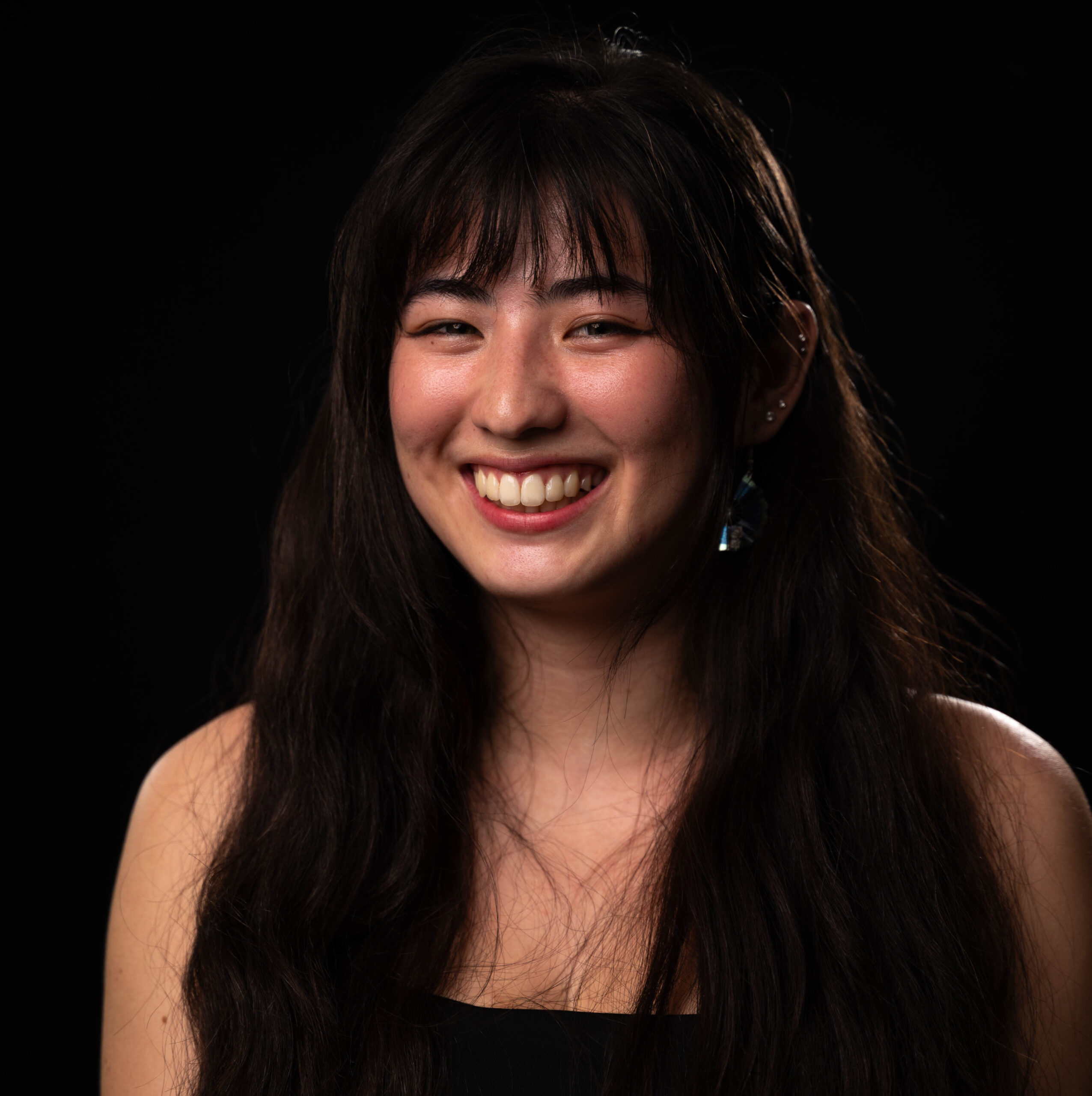 53894315703_4e39881a69_o A girl smiling wide