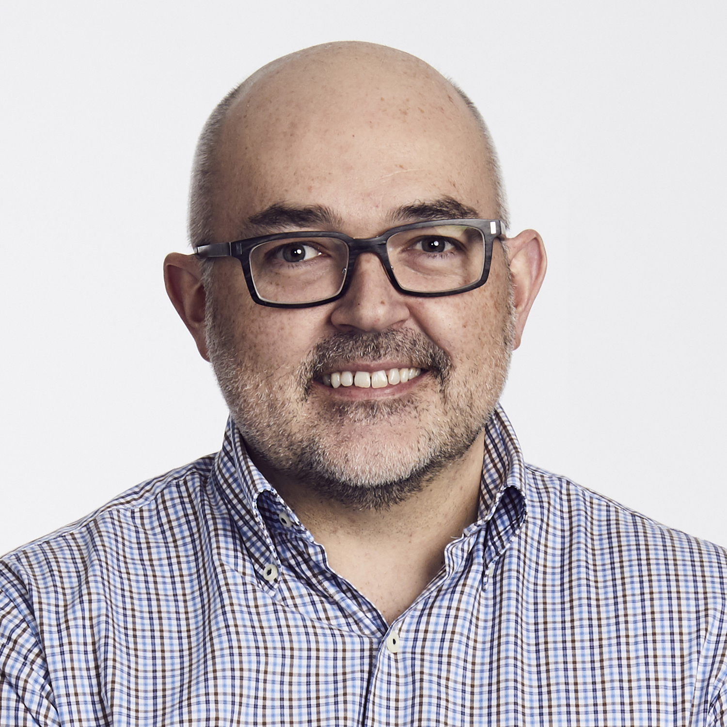 Billy_Seabrook_1500x1500_headshot Photo of man with glasses smiling to camera