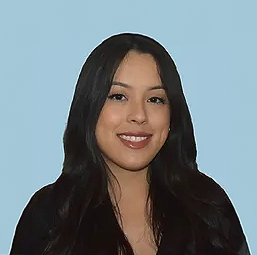 ruby-cisneros-headshot Headshot of a woman smiling at camera