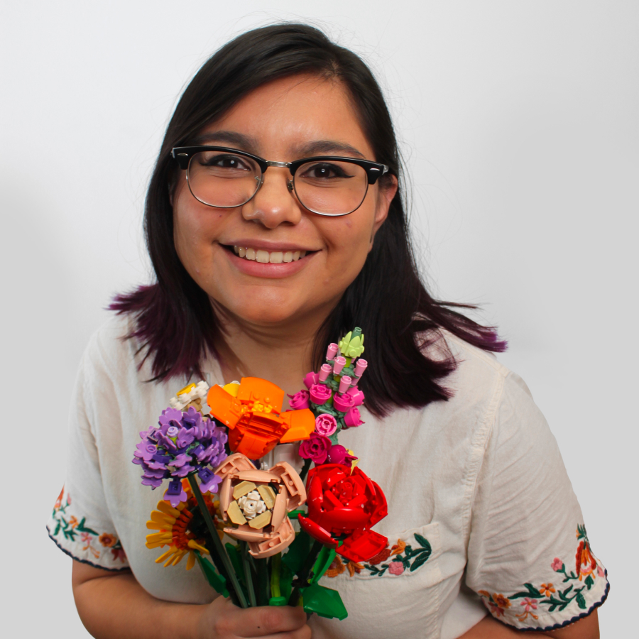 Edited-Carla-Chosen-Image - Carla Jimenez 1 Headshot of woman smiling with her head tilted