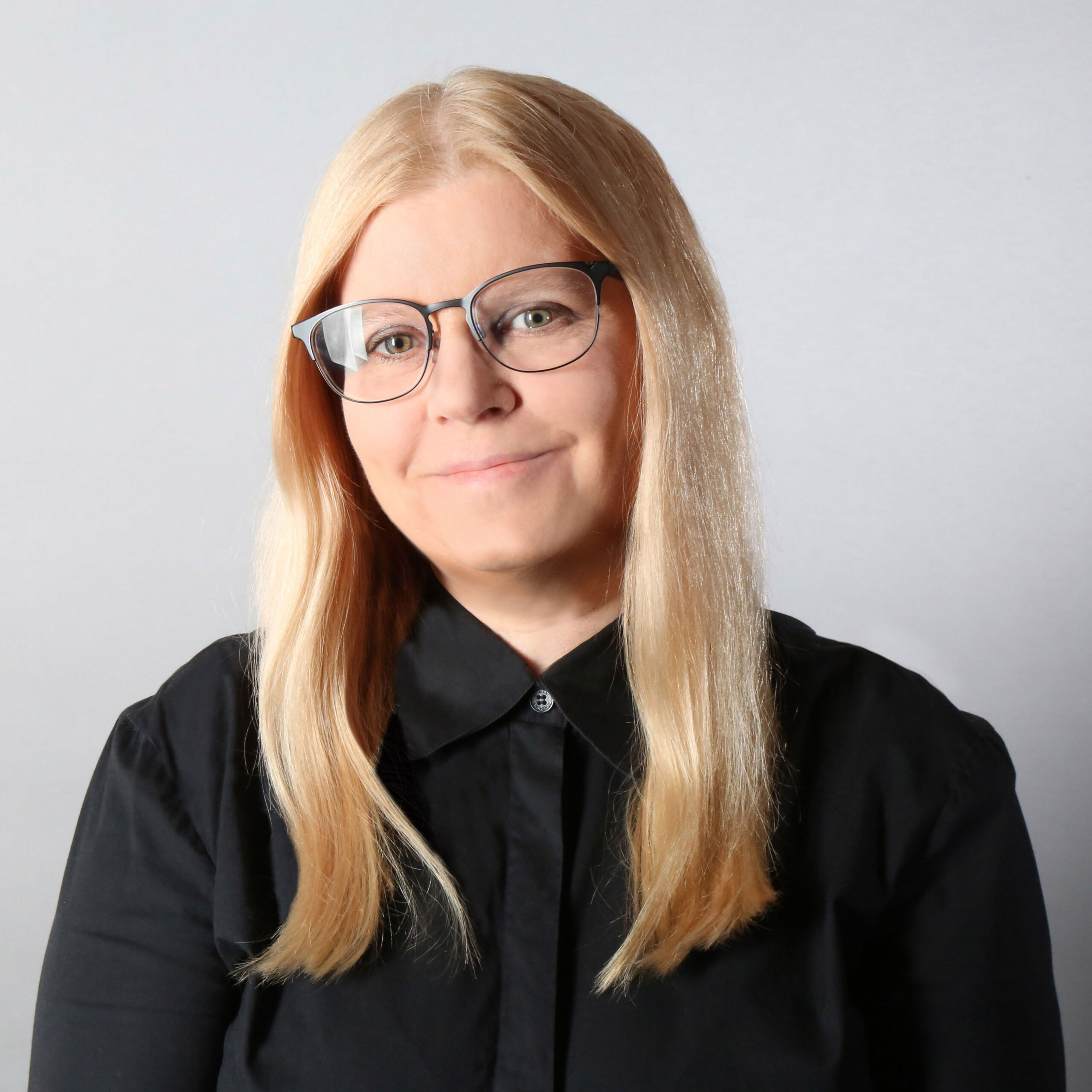 KrisTibor_photo2024 - kris tibor Woman with glasses and a black button up