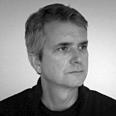 gl_headshot - Greg Lindy Black and white headshot