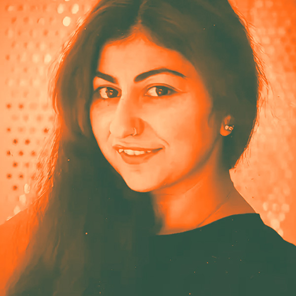 girl with hijab smiling at camera